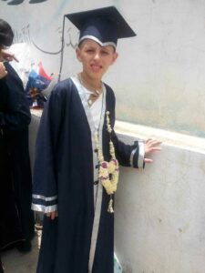 محمد القطوي قبل العملية 2016 بعد تكريمه ضمن اوائل طلاب المدرسة 