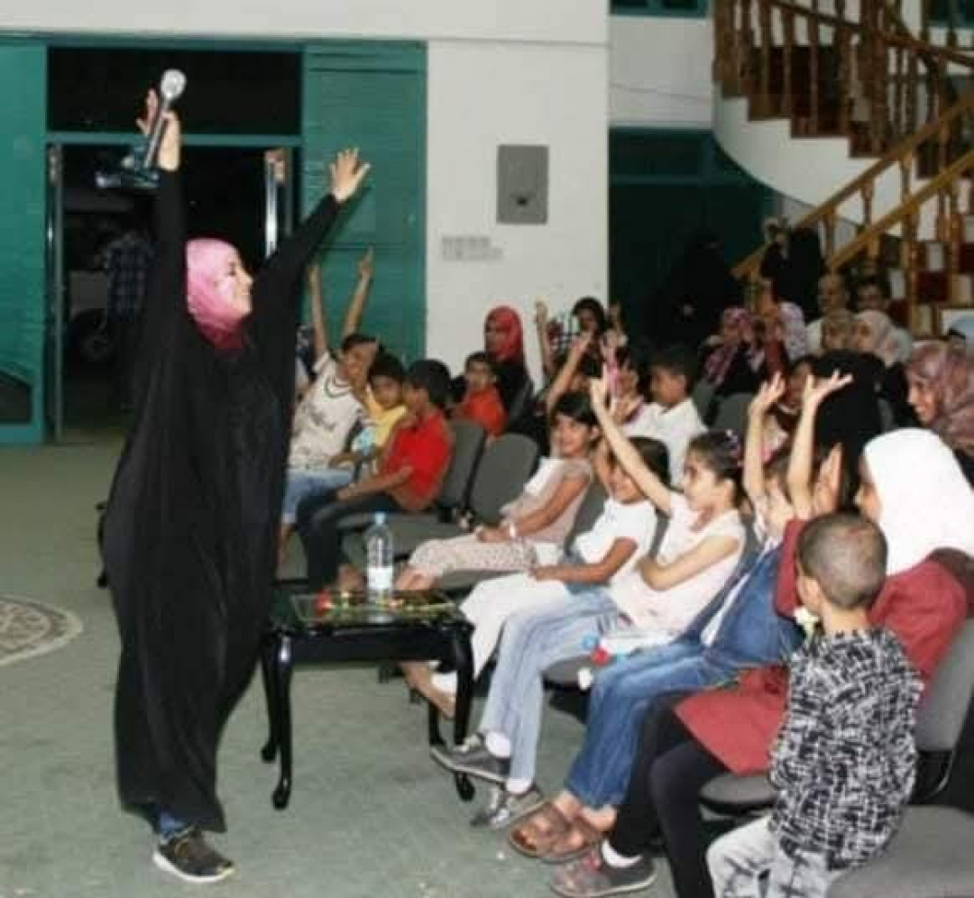 مها صلاح في احدى الفعاليات مع الأطفال مها صلاح في احدى الفعاليات مع الأطفال