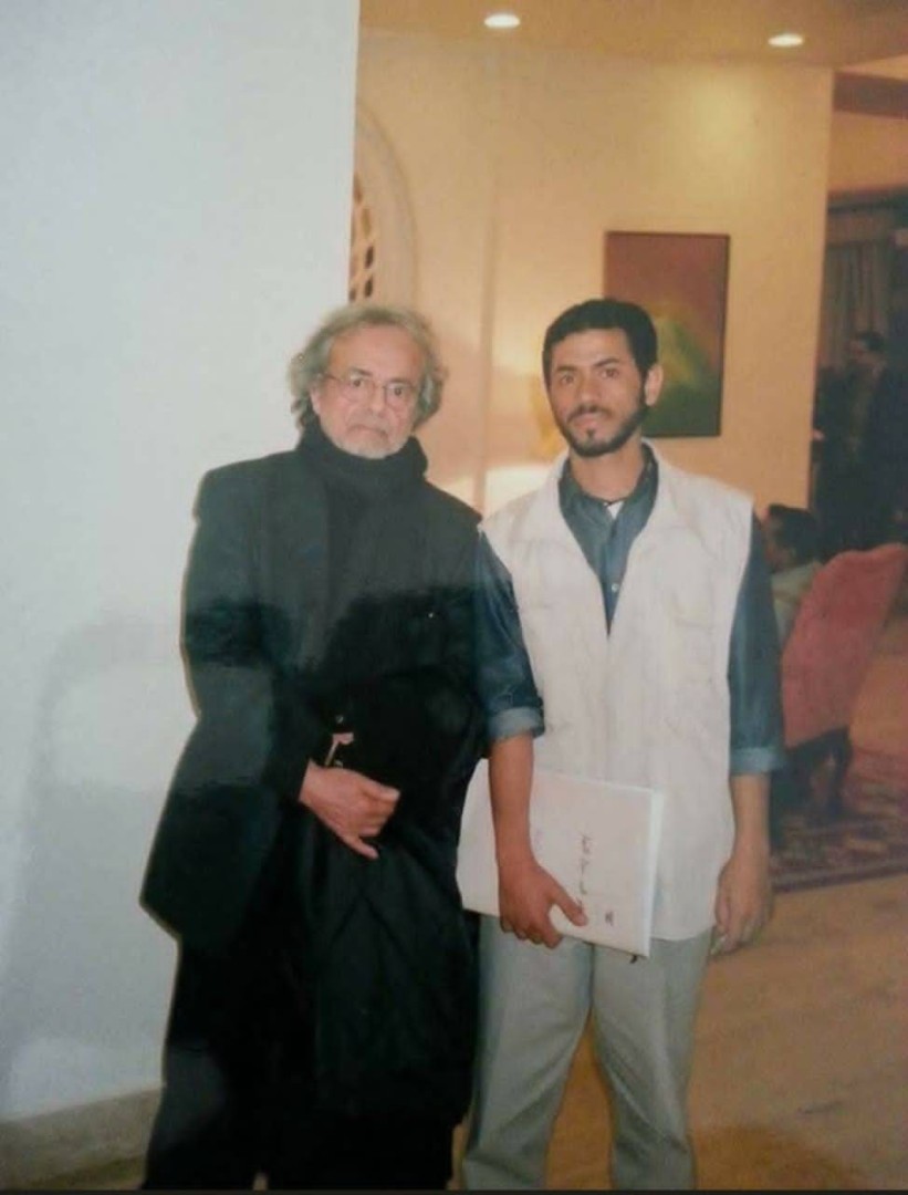 الكاتب مع ادونيس